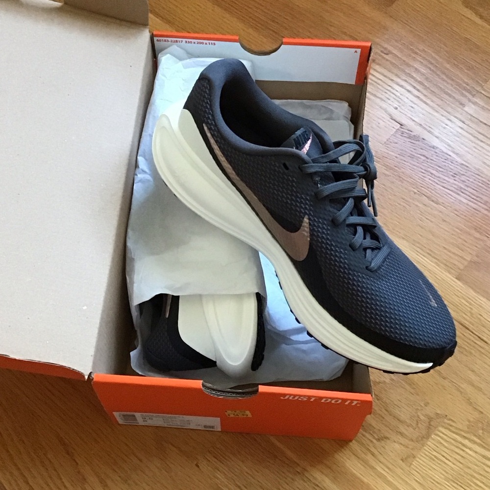 Nike woman Athletic Shoe - Black with Rose Gold Swoosh